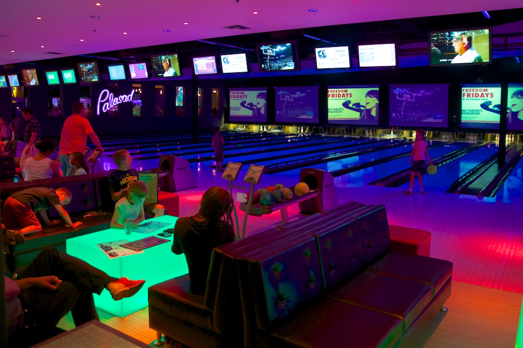 side view of bowling seat area at the palasad in front of lanes