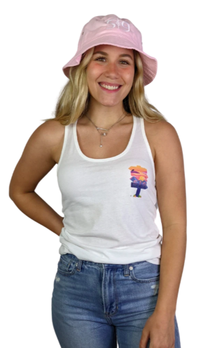 woman wearing a white tank top with sunset coloured branding on the left breast with a pink bucket hat on