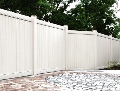 large backyard fence in white