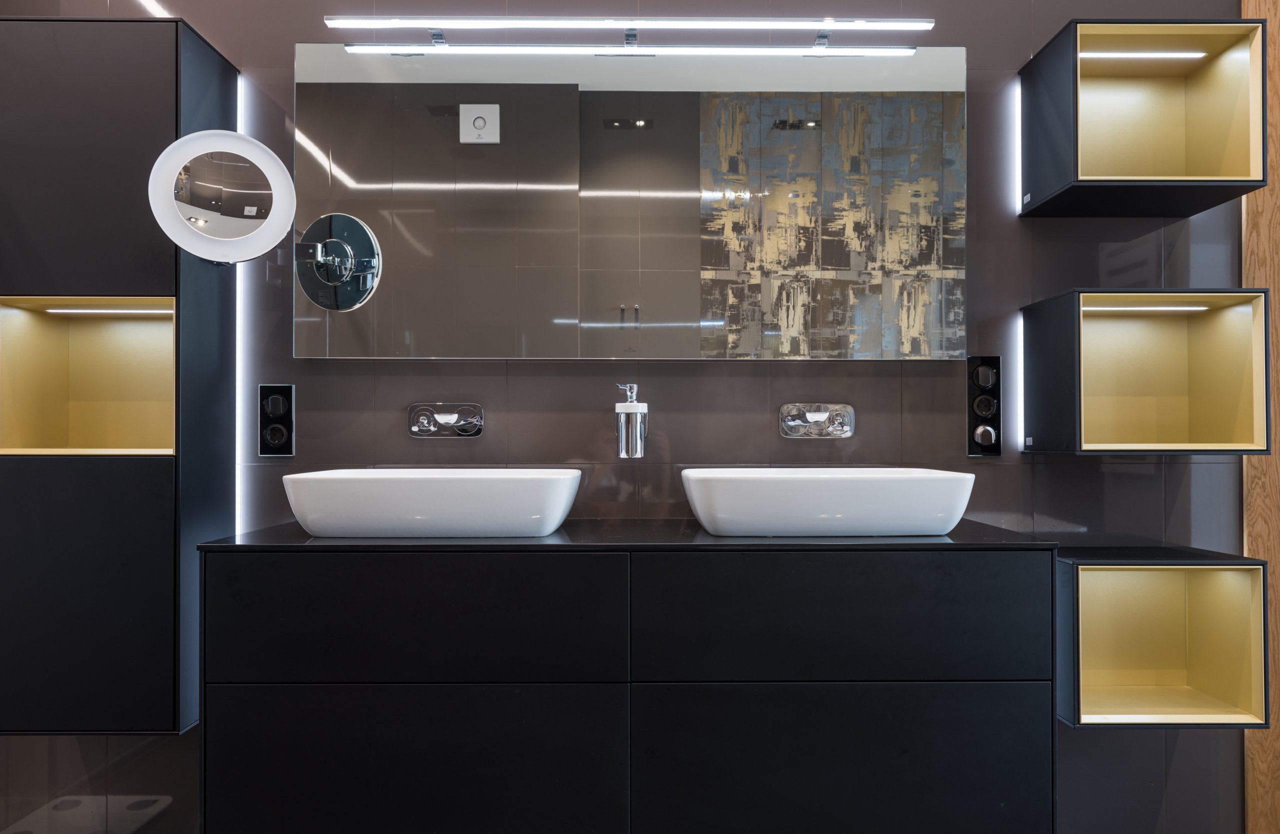 Modern looking bathroom with dark detailing and double sink feature