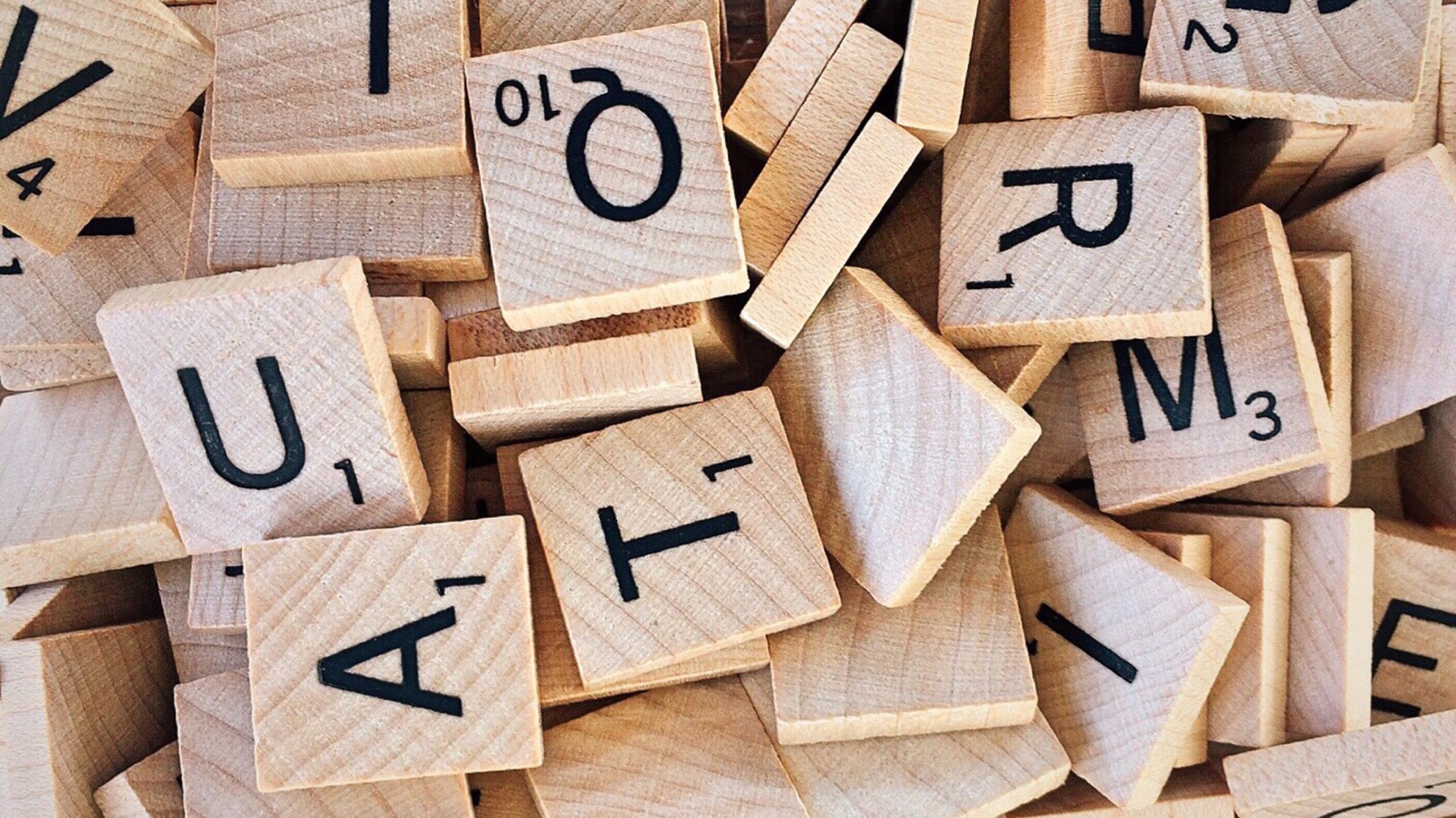 Various scrabble pieces in a pile