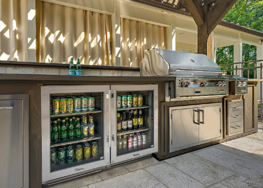 Outdoor beer fridge beside a bbq