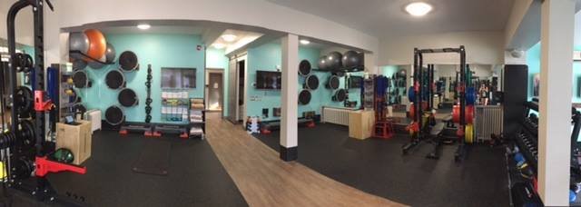 panoramic photo of workout facility featuring various equipment