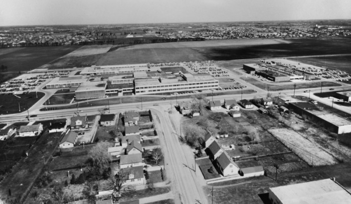 historic aerial view of campus layout in black and white