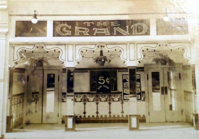 historic front entrance to theatre from newspaper clipping