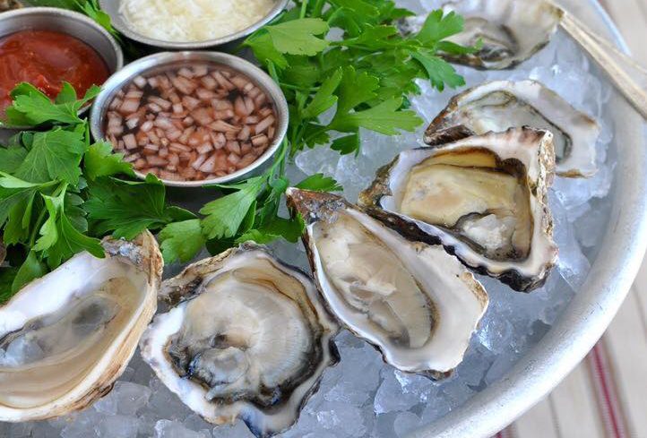 oysters on crushed ice with sauces