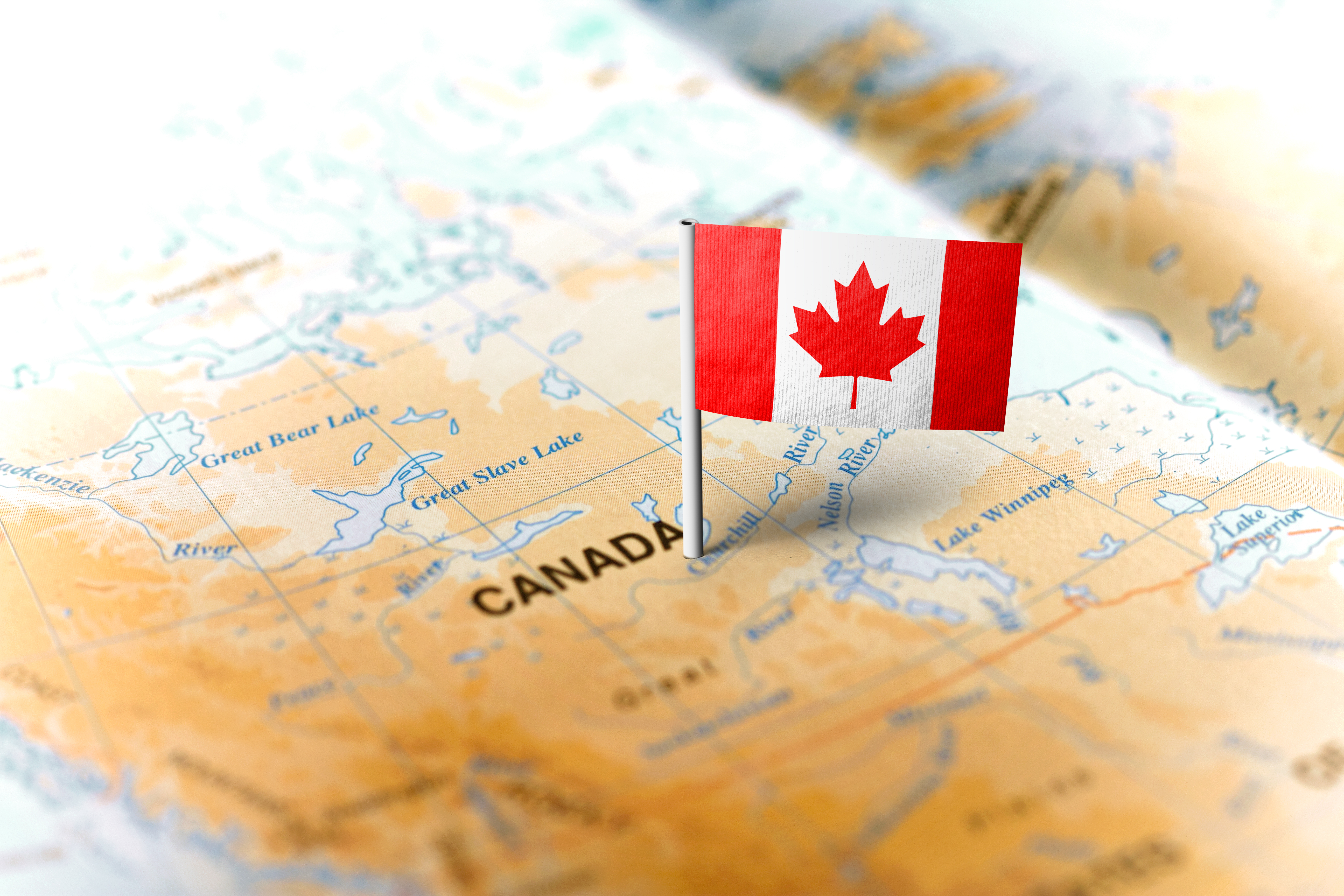 canada on illustrated map with canadian flag for label